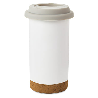These Hands Hold My Heart Ceramic Travel Mug, 12.5 oz. with grey silicone lid and cork base, angled view showing minimalistic design.