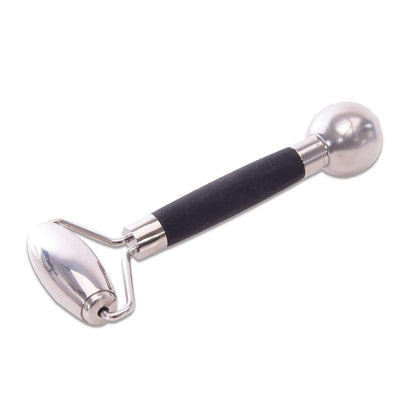 5 cooling facial roller made from stainless steel with a black silicone grip, showcasing the dual-ended design.