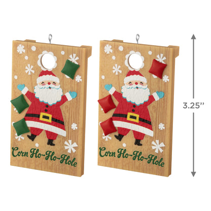 Corn Ho-Ho-Hole — 2025 Hallmark Keepsake Christmas Ornament with Santa design, featuring red and green beanbags, angled view.