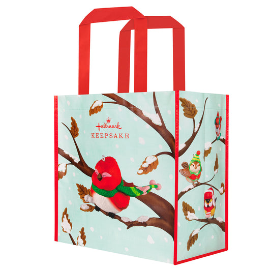 Cozy Critters Reusable — 2026 Hallmark Keepsake 13.75" Christmas Tote Bag with red handles and colourful birds on a snowy branch.