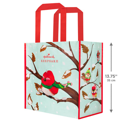 Cozy Critters Reusable — 2026 Hallmark Keepsake 13.75" Christmas Tote Bag with red handles, featuring colourful birds on a snowy branch backdrop.