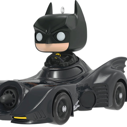 DC™ 1989 Batman™ in His Batmobile™ Funko POP!® ornament featuring a black plastic design with detail of the character's cape.