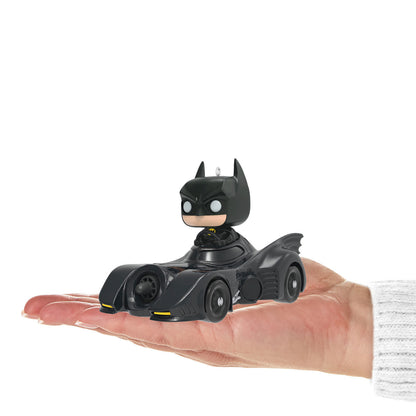 DC™ 1989 Batman™ in His Batmobile™ Funko POP!® — Hallmark Keepsake Christmas Ornament held in a hand, showcasing detailed design and size.