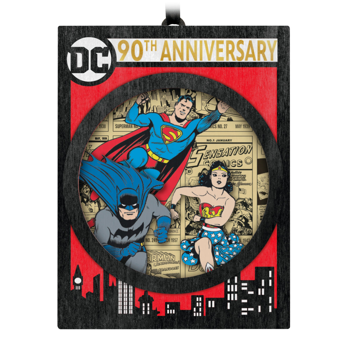 DC™ Comics 90th Anniversary — 2025 Hallmark Keepsake Christmas Ornament featuring Superman, Batman and Wonder Woman, laser-cut wood design with vibrant colours.