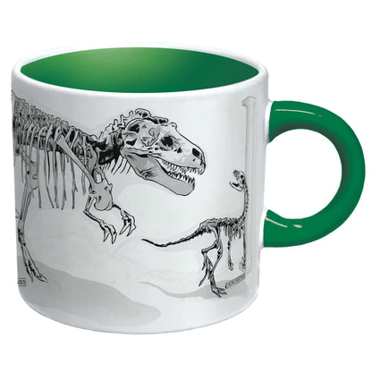 Unemployed Philosophers Guild - Dinosaur Mug featuring a green handle, showcasing dinosaur skeletons in black and white.