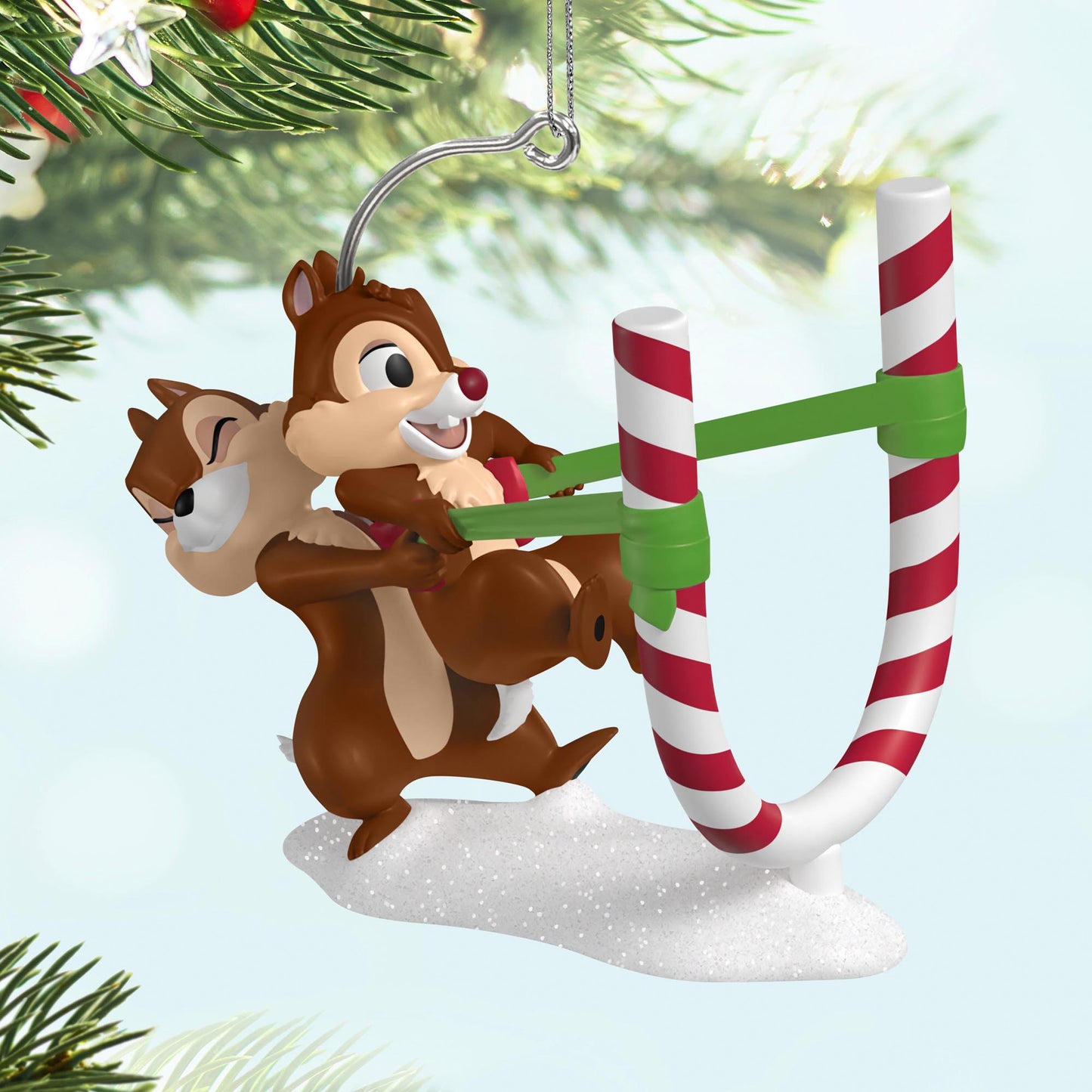 Disney Chip ’n Dale, Candy Cane Catapult — 2025 Hallmark Keepsake Christmas Ornament with Chip launching Dale from striped candy cane catapult in detailed snowbank.