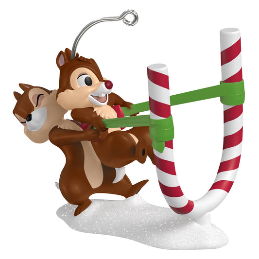 Disney Chip ’n Dale, Candy Cane Catapult — 2025 Hallmark Keepsake Christmas Ornament, festive decoration with Chip launching Dale from a candy cane catapult in a snowy setting.