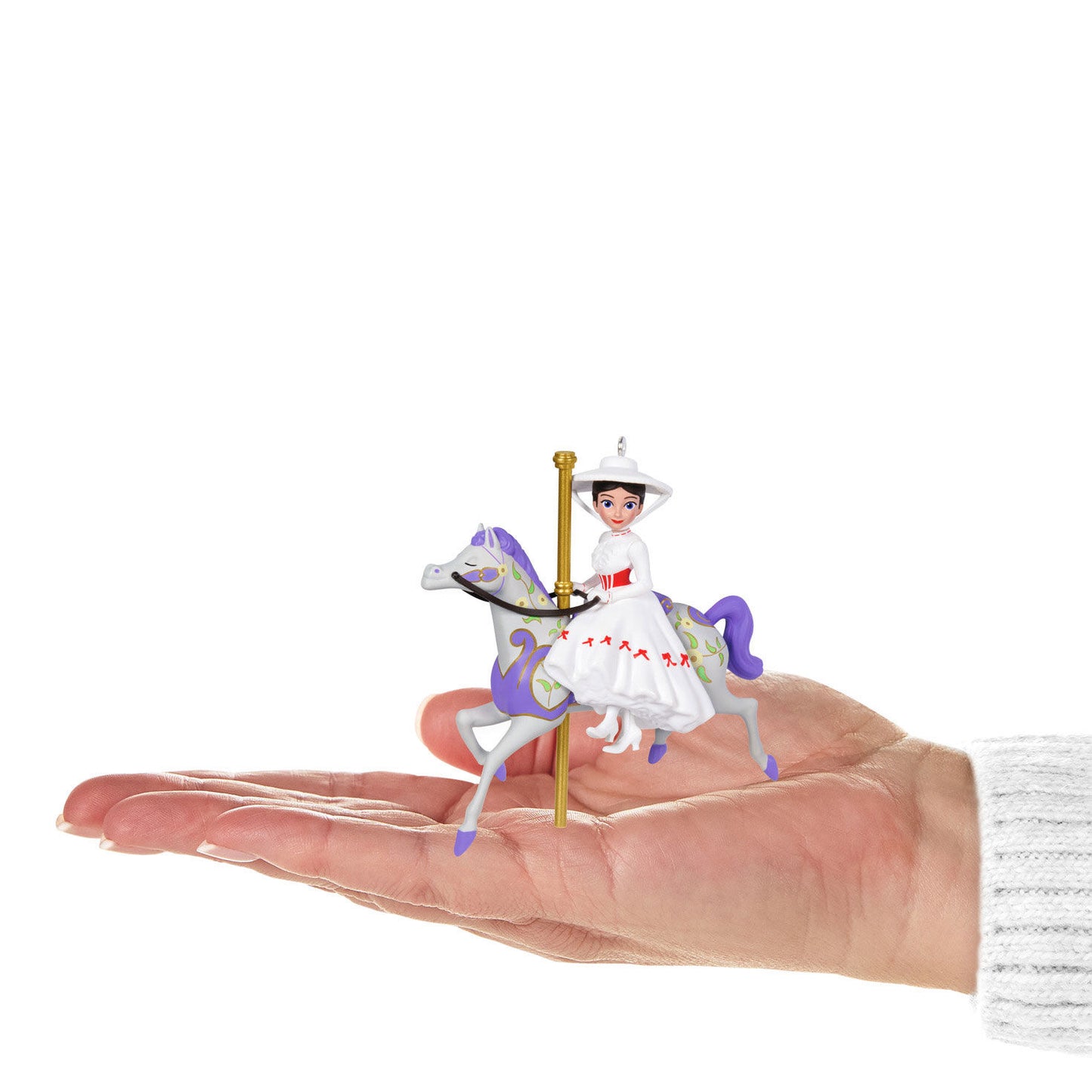 Disney Mary Poppins, 60th Anniversary A Practically Perfect Carousel Ride — Hallmark Keepsake Christmas Ornament held in hand, featuring Mary Poppins on a purple carousel horse.