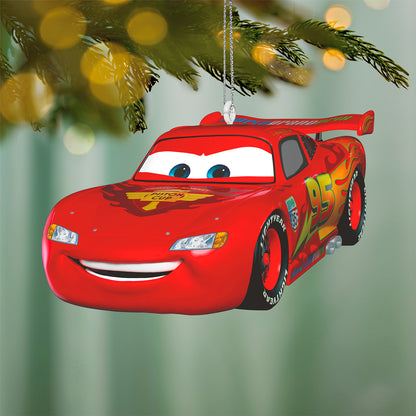 Disney/Pixar Cars 2 15th Anniversary Lightning McQueen, metal ornament with vibrant red colour and smiling face, hanging on a tree.