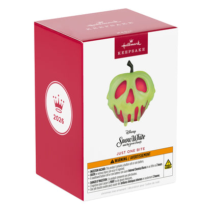 Disney Snow White and the Seven Dwarfs Just One Bite With Light — 2026 Hallmark Keepsake Christmas Ornament packaging featuring a green poison apple.