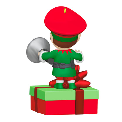 Elf Security Peekbuster With Motion-Activated Sound and Light — 2026 Hallmark Keepsake Christmas Ornament, back view of elf holding a megaphone on a Christmas gift.