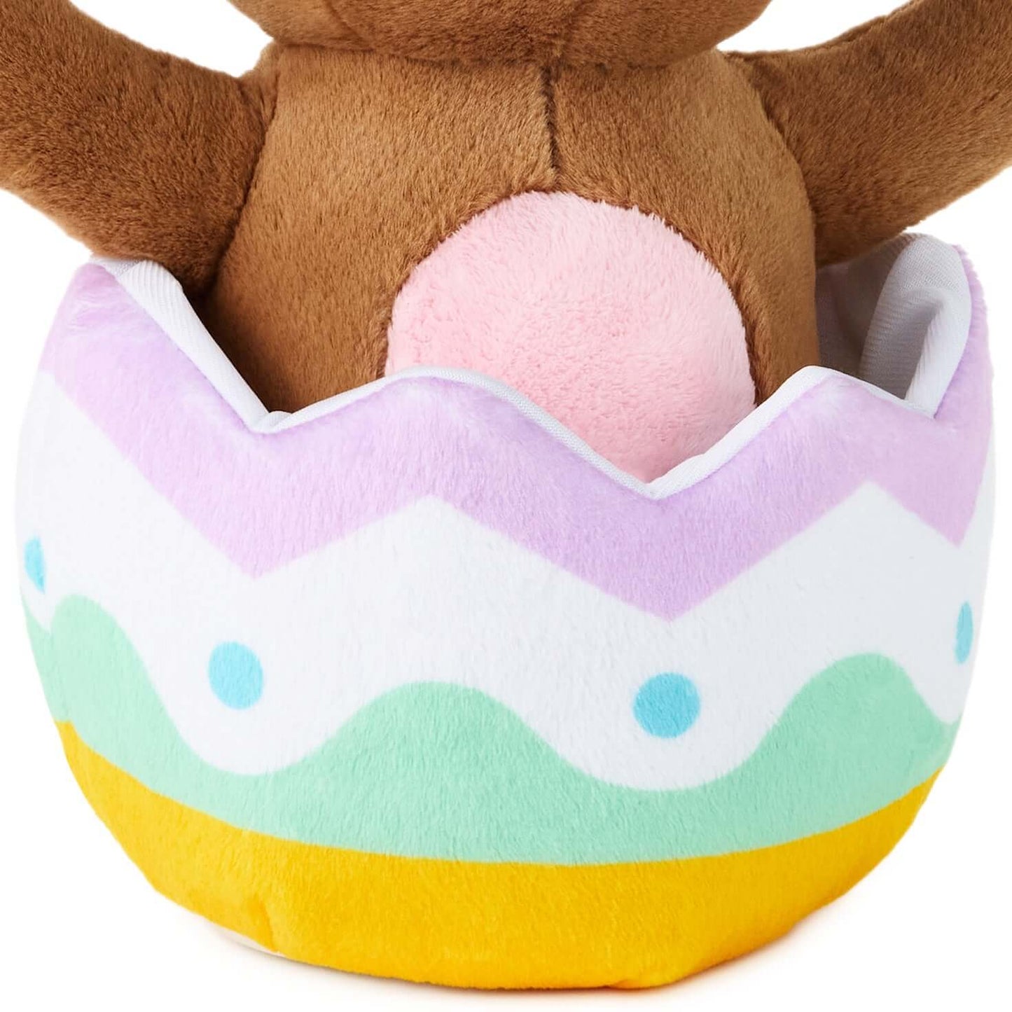 Excited for Eggs Bunny Plush With Sound and Motion, soft brown bunny nestled in a pastel coloured egg, plush detail on back.