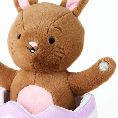 Excited for Eggs Bunny Plush With Sound and Motion, soft brown plush bunny with pink accents, close-up view of paws