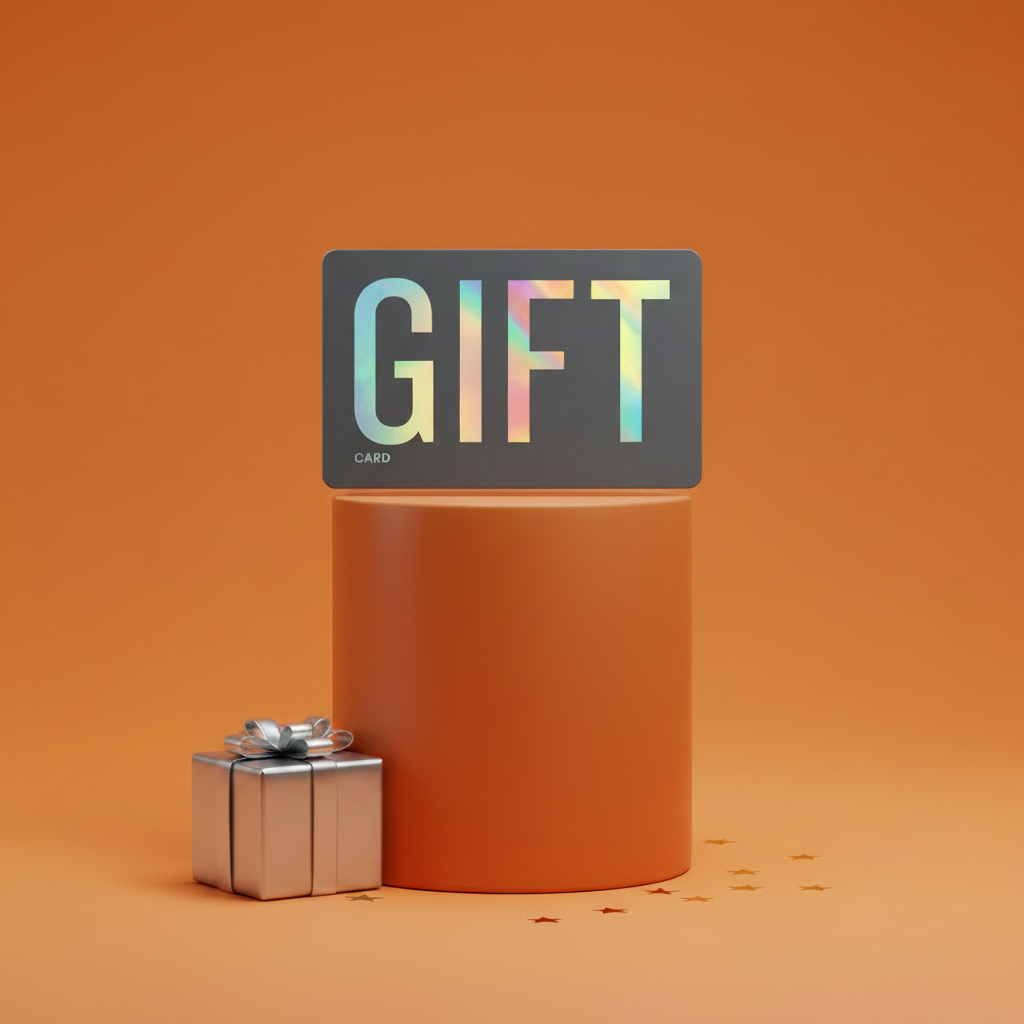 Orange cylindrical gift box with a 'GIFT' card on an orange background