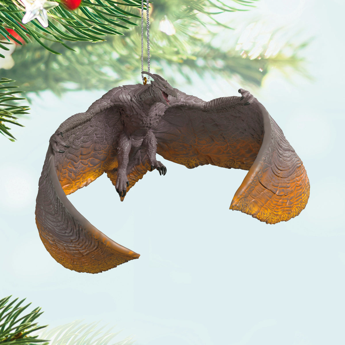 Godzilla: King of the Monsters, Rodan — 2025 Hallmark Keepsake Christmas Ornament, detailed, bio-volcanic pterosaur, hanging among green Christmas tree branches.