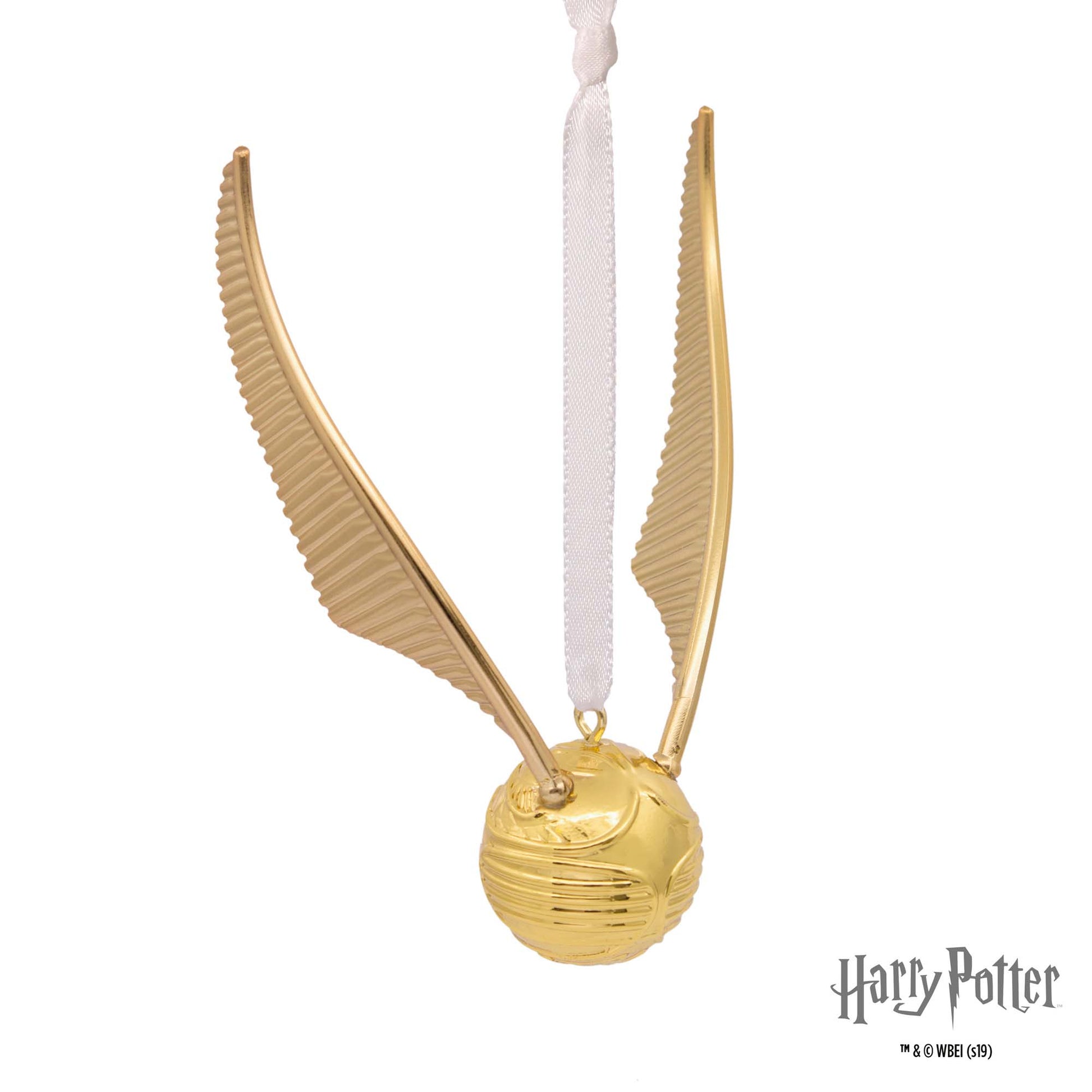 Hallmark Christmas Ornament (Harry Potter Golden Snitch Premium Metal) in gold with detailed wings, hanging from a white ribbon.