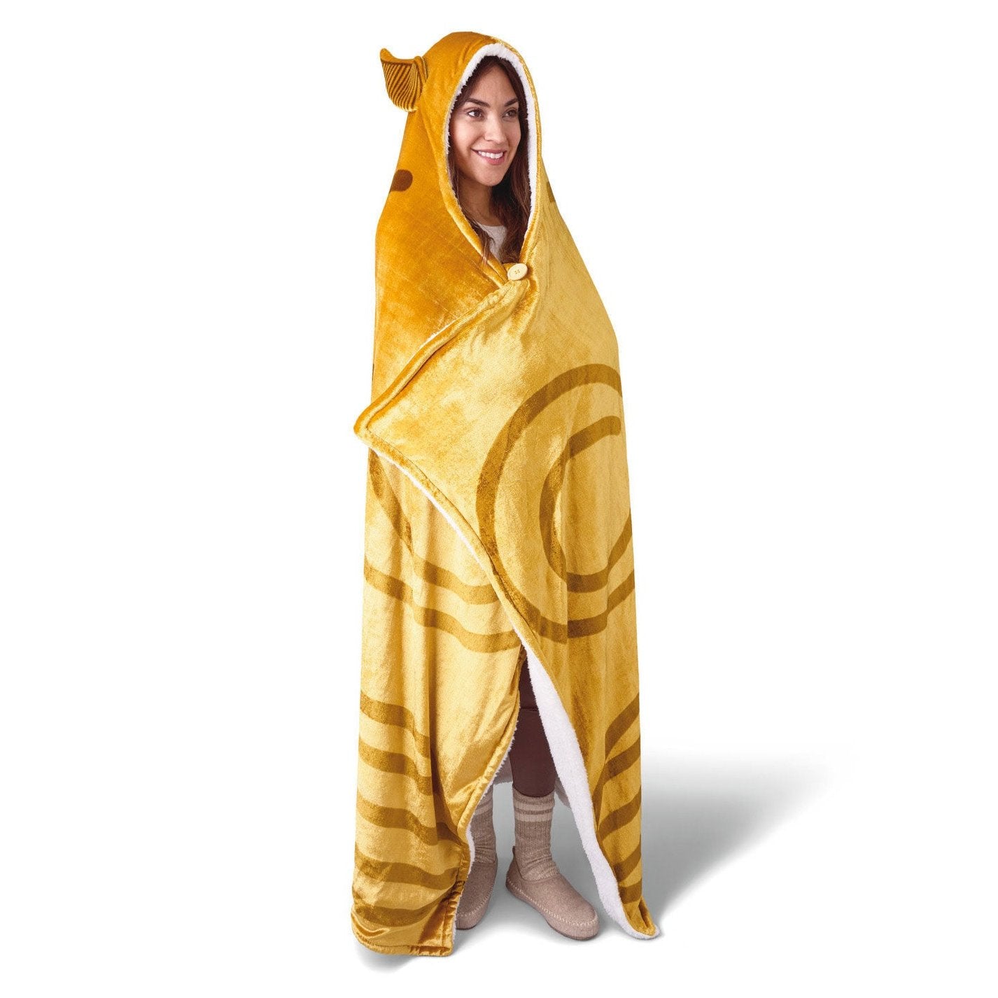 Harry Potter™ Golden Snitch™ hooded blanket in gold fleece worn by a model, featuring wings and large button detail.