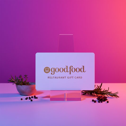 Goodfood restaurant gift card on a stand with decorative elements on a gradient background