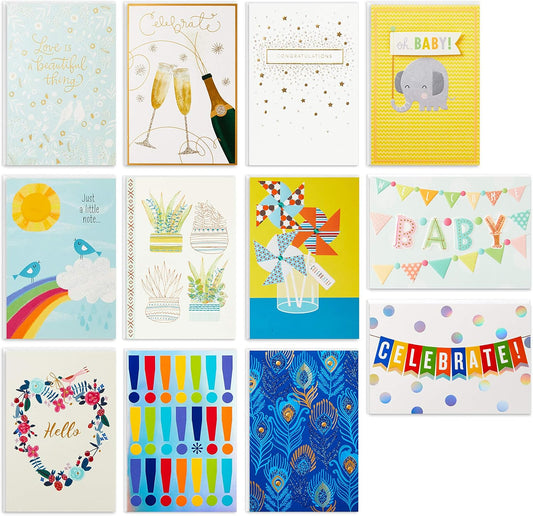 Hallmark All Occasion Cards Assortment Birthday, Congratulations, Blank Cards featuring vibrant designs and embellishments in a flat lay display.