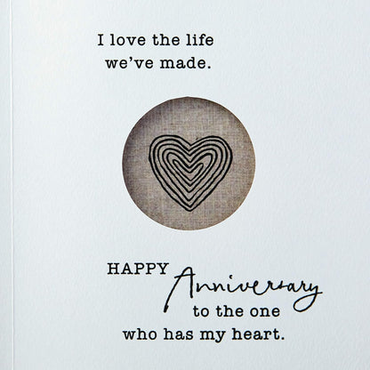Hallmark Anniversary Greeting Card (Two Hearts) featuring heartfelt message and layered heart design, close-up view.