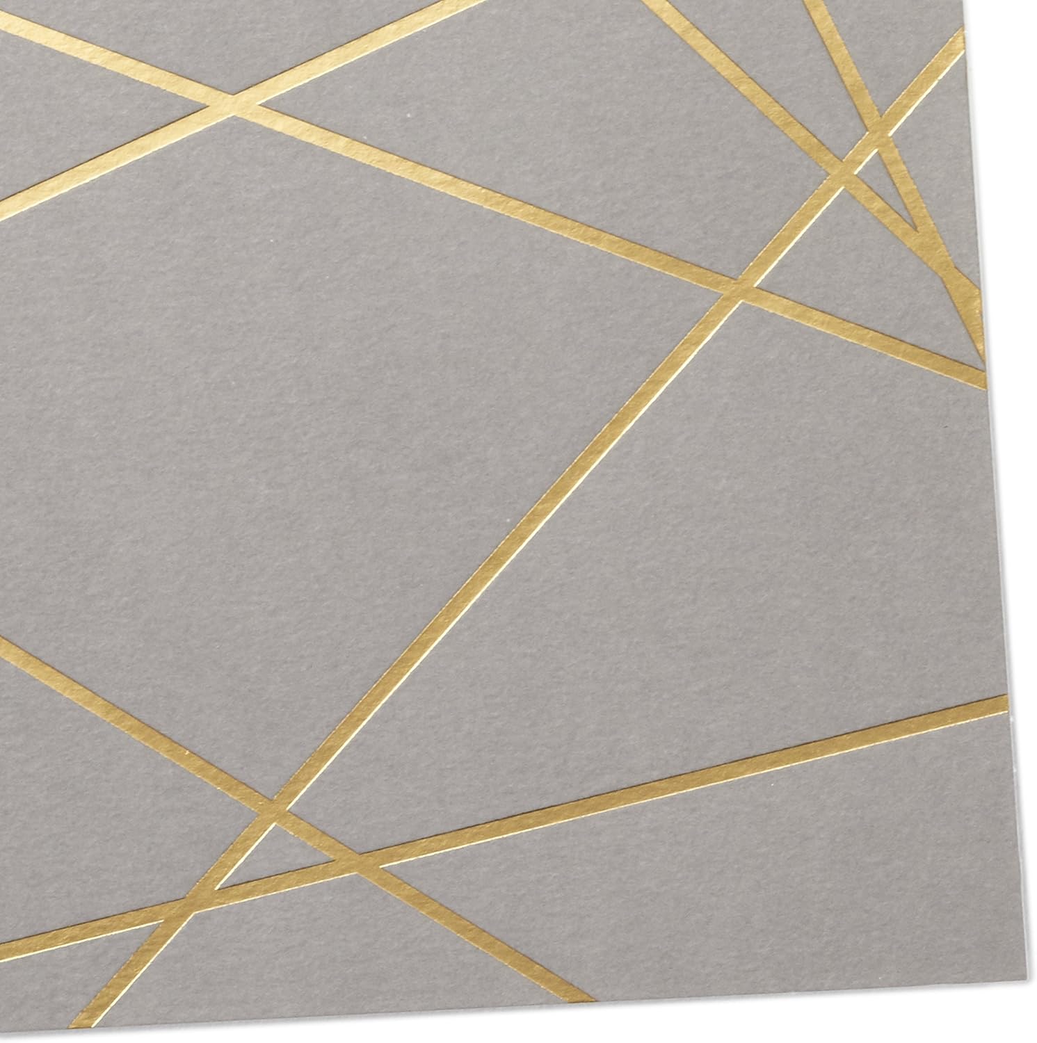 Hallmark Blank Cards, Gold Foil Lines in an abstract design on gray background, close up detail of gold lines.
