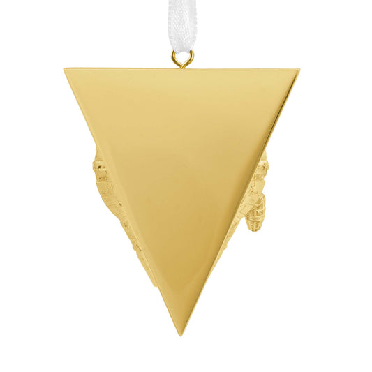 Hallmark Christmas Ornament (Star Wars™ Millennium Falcon Premium Metal) in shiny gold, triangular shape viewed from the front.