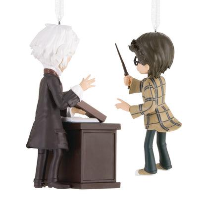 Hallmark Christmas Ornaments - Harry Potter and Ollivander, Set of 2 featuring stylised figurines in a playful scene.