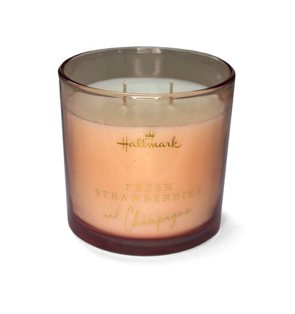 Hallmark Essential Oil Australian Soy Wax Candle - Fresh Strawberries & Champagne in a pink glass holder, two wicks visible.