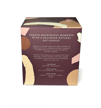 Hallmark Essential Oil Australian Soy Wax Candle - Vanilla Bean & Buttery Caramel in gift packaging with fragrance notes listed.