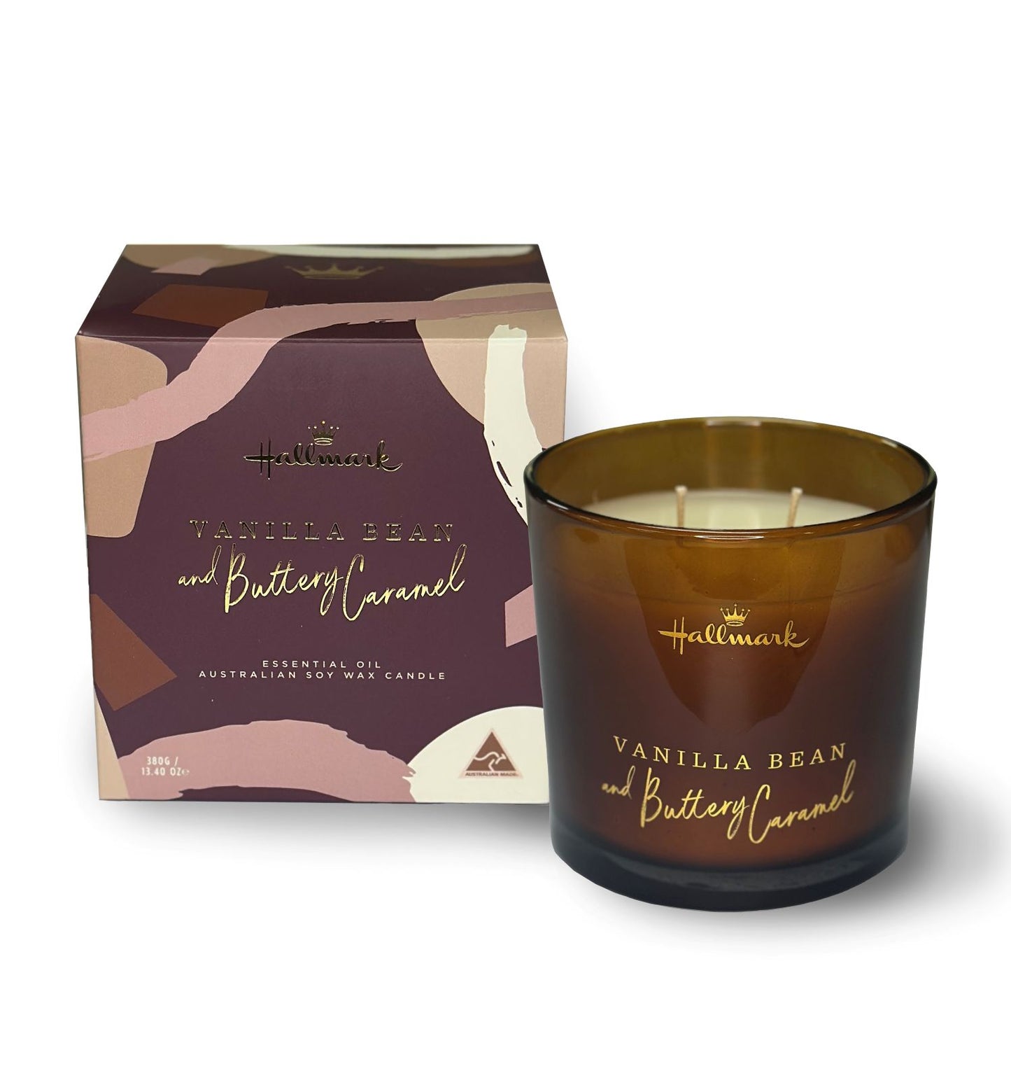 Hallmark Essential Oil Australian Soy Wax Candle - Vanilla Bean & Buttery Caramel in a glass jar with packaging, showcasing elegant design.