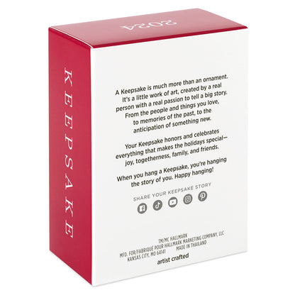Hallmark Keepsake Christmas ornament packaging, artist crafted, featuring heartfelt message on the back, red and white design.