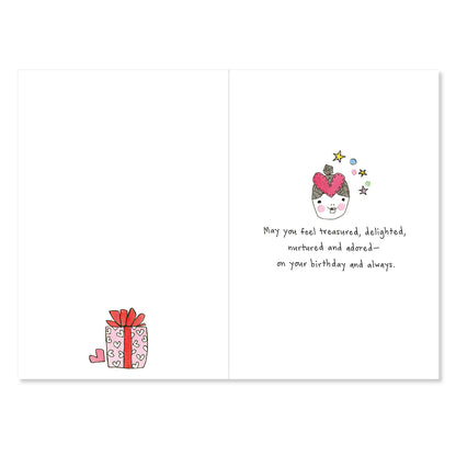 Greeting card with a cartoon character and gift box on a white background