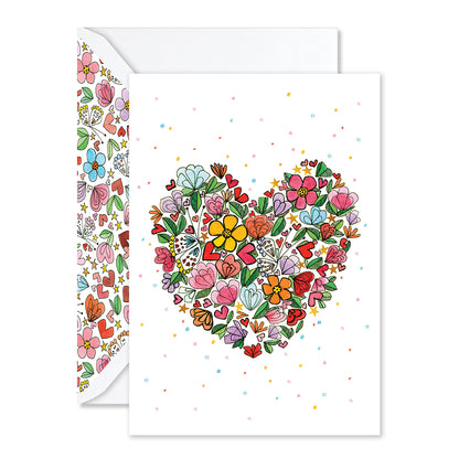 Greeting card with floral heart design on a white background