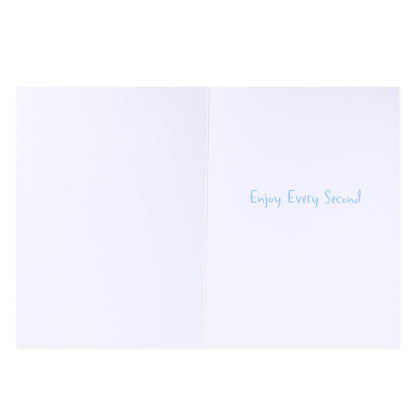 Hallmark Colossal New Baby Congratulations Greeting Card - Rainbow & Spots, inside view with blue text saying 'Enjoy Every Second' on white background.