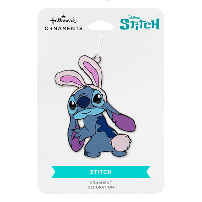 Hallmark Ornament (Disney Stitch Bunny, Metal) featuring Stitch with pink rabbit ears on packaging, flat lay view.