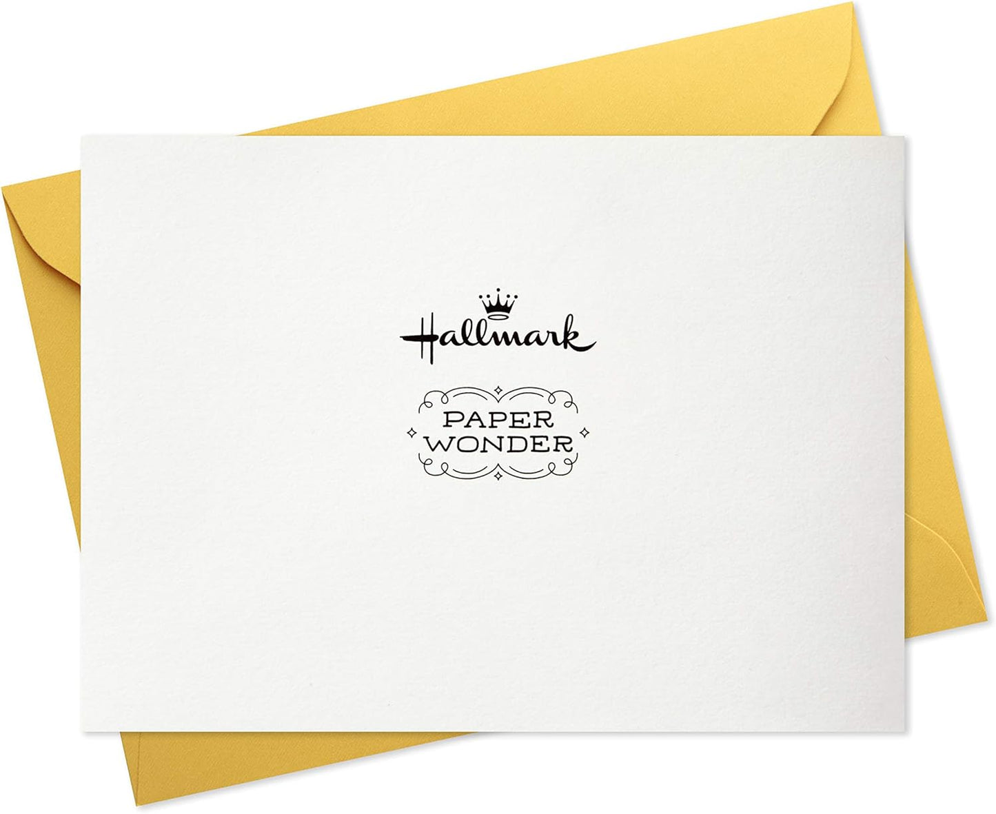 Hallmark Paper Wonder Pop Up Baby Shower Card (Sweet Dream Come True) on yellow envelope, showing logo detail and clean design.