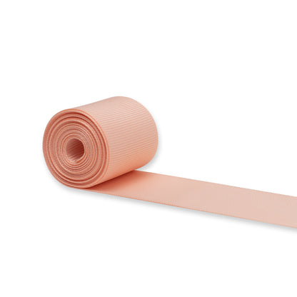 Hallmark Peach Grosgrain Ribbon - 2m in a rolled view, showcasing its textured finish and soft pastel peach colour.