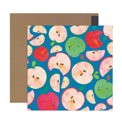 Hallmark x Kasey Rainbow Gallery Blank Greeting Card - An Apple A Day with vibrant apple illustrations on a blue background, featuring a kraft envelope.