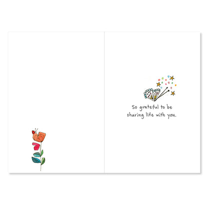 Greeting card with floral illustration and text on a white background