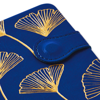 Hardcover slim journal - gingko leaves with gold foil detail and magnetic closure, showcasing the dark blue cover design close up.