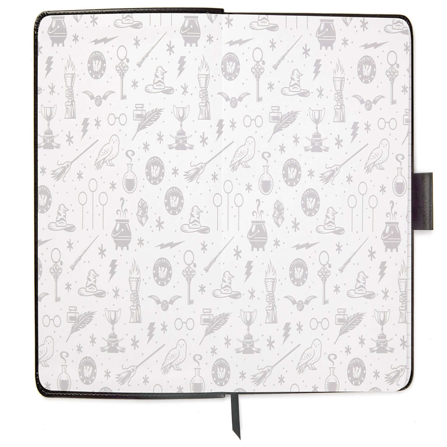 Harry Potter™ Faux Leather Journal, 6.18x8.25 with grey patterned interior featuring iconic Wizarding World symbols in a flat lay view.