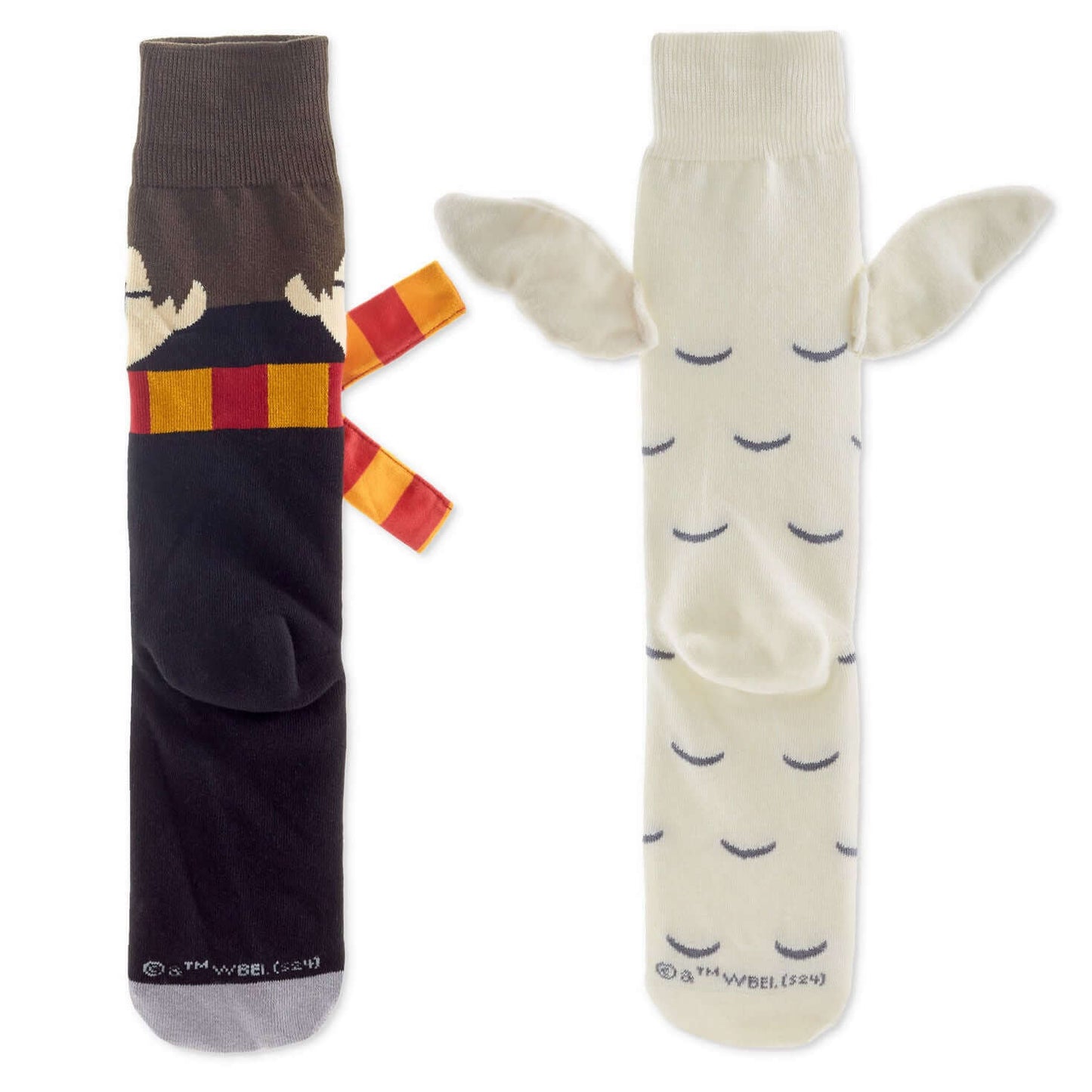 Harry Potter™ and Hedwig™ novelty crew socks featuring Gryffindor design and Hedwig's wings in a flat lay view.