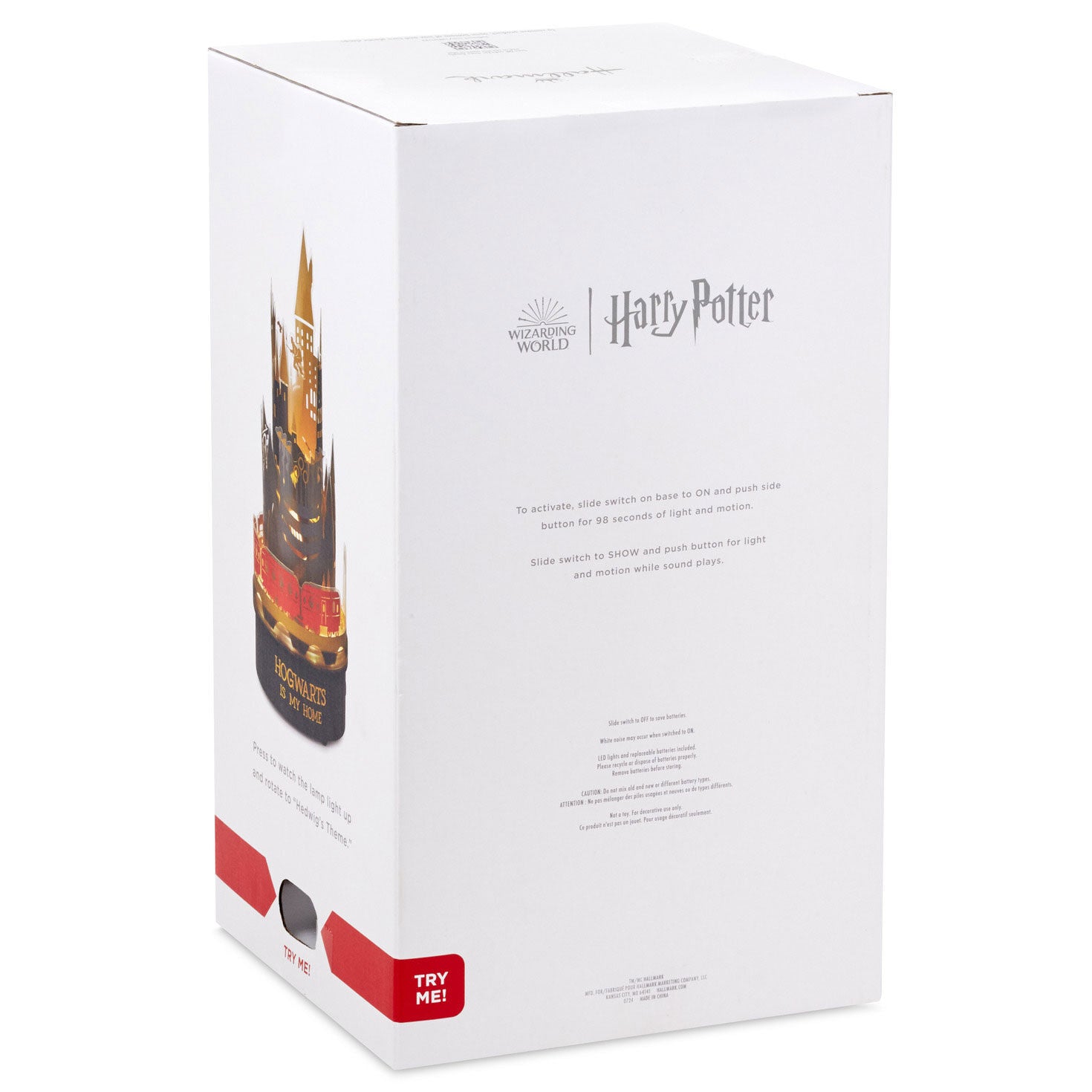 Harry Potter™ Hogwarts Rotating Lamp With Sound packaging box featuring Wizarding World graphics and a ‘Try Me’ button.