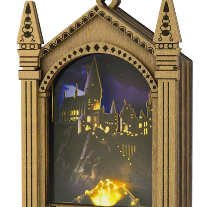 Harry Potter™ Hogwarts™ Musical Papercraft Ornament With Light — 2025 Hallmark Keepsake Christmas Ornament, detailed laser-cut wood frame showcasing illuminated Hogwarts.