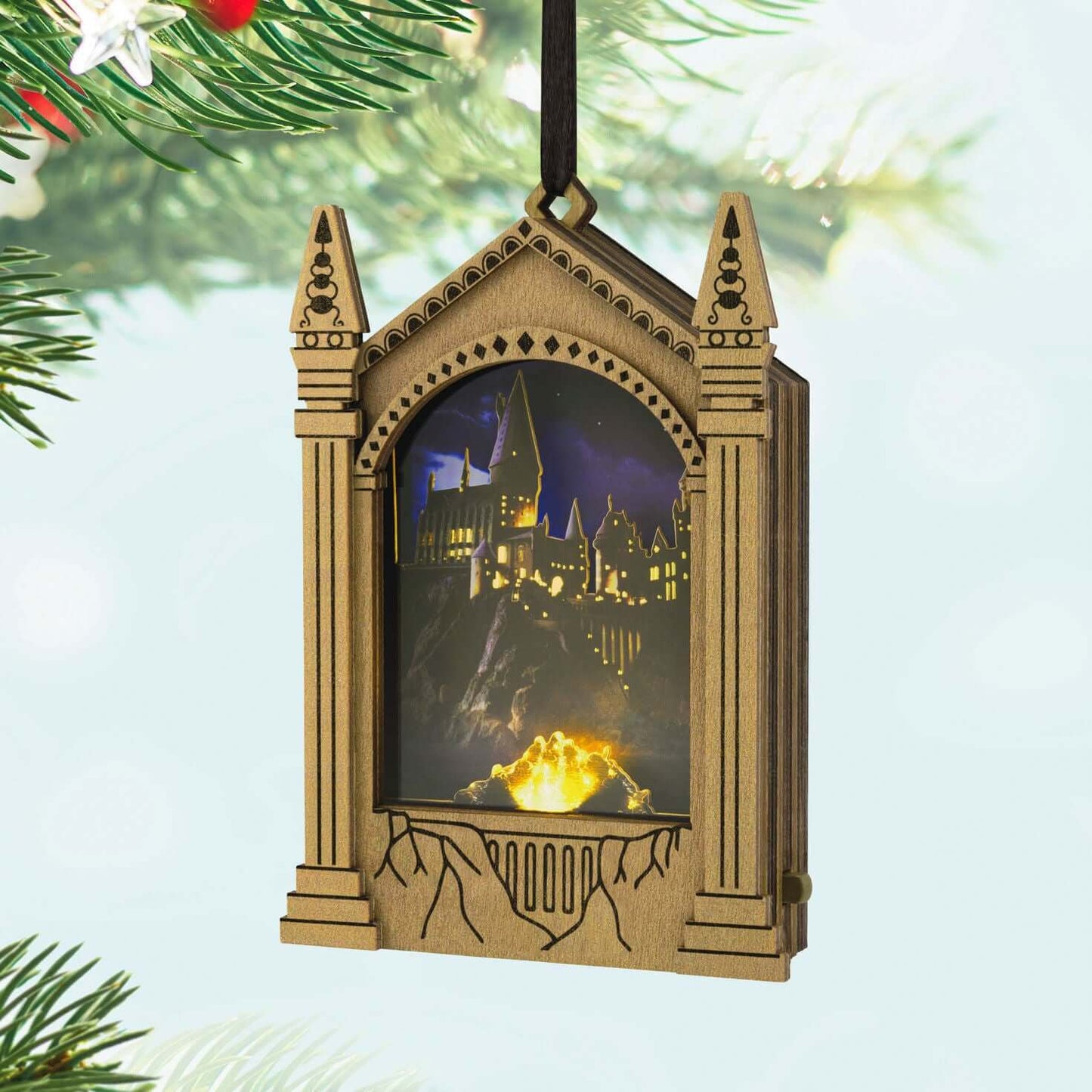 Harry Potter™ Hogwarts™ Musical Papercraft Ornament With Light — 2025 Hallmark Keepsake Christmas Ornament, detailed castle frame with illuminated scene.