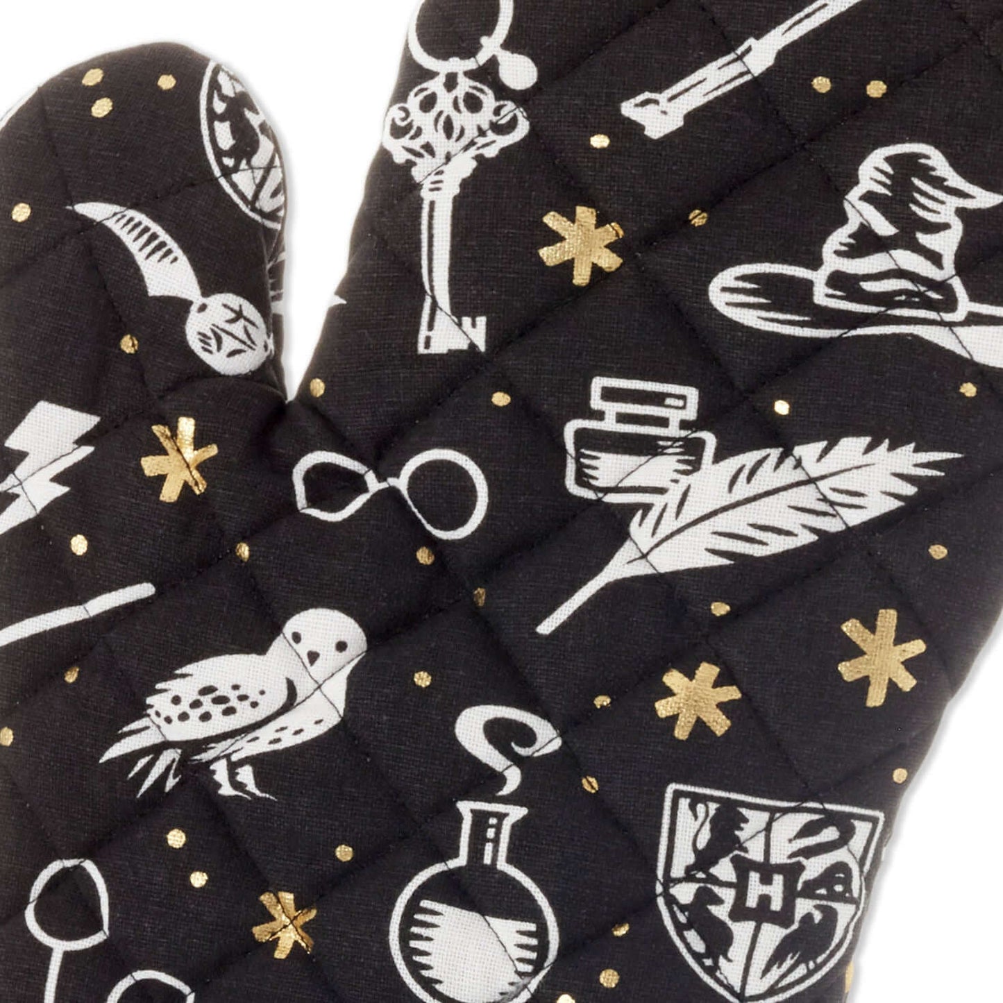 Harry Potter™ Magical Icons Oven Mitt in black cotton with white and metallic gold pattern showcasing iconic symbols and characters.