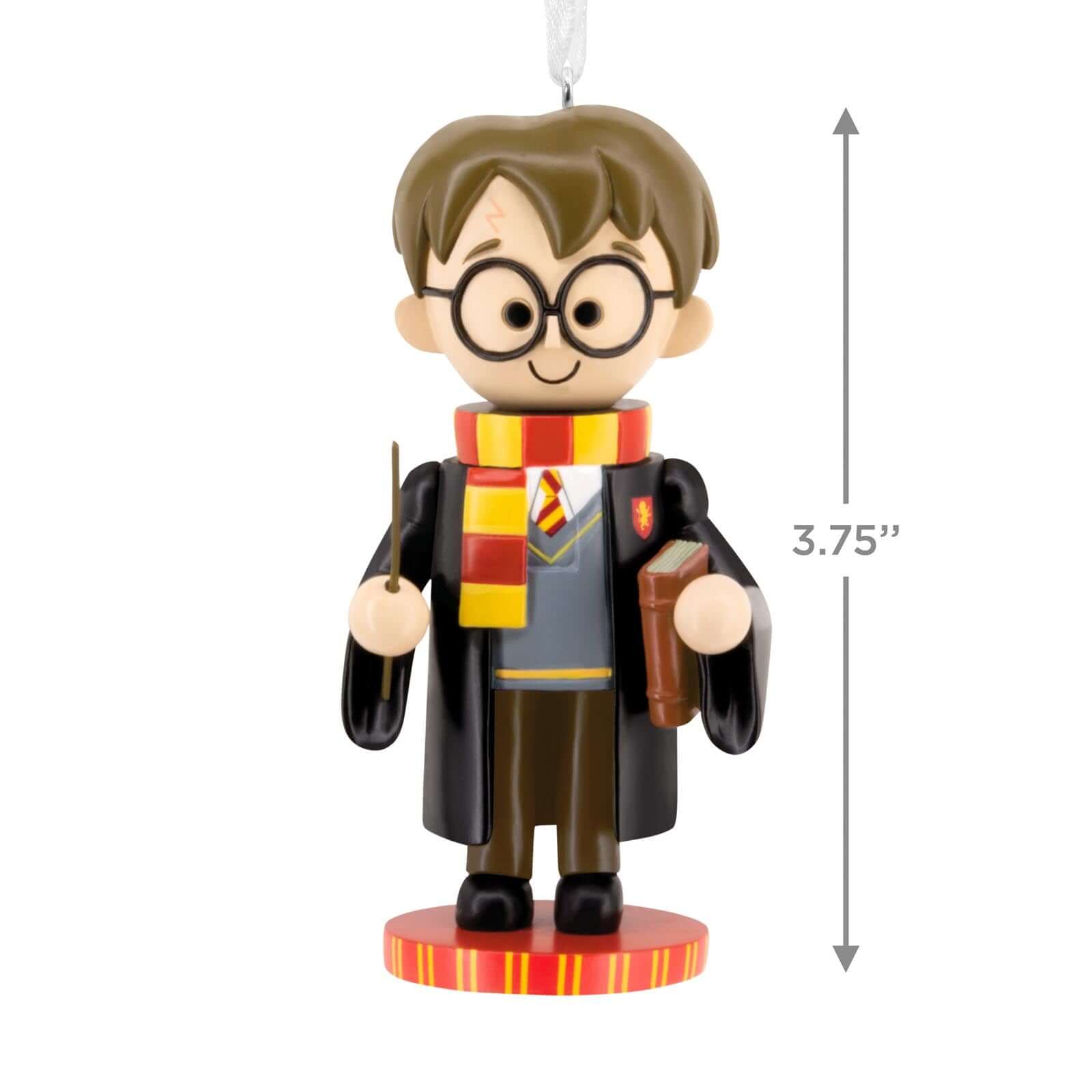 Harry Potter Nutcracker - Hallmark Christmas Ornament, 9.5 cm tall, dressed in Gryffindor robes with a wand and book.