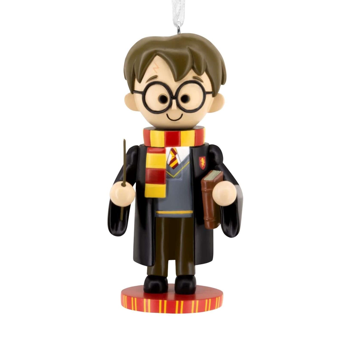 Harry Potter Nutcracker - Hallmark Christmas Ornament in colourful design, depicting Harry with wand and books, suspended from a string.