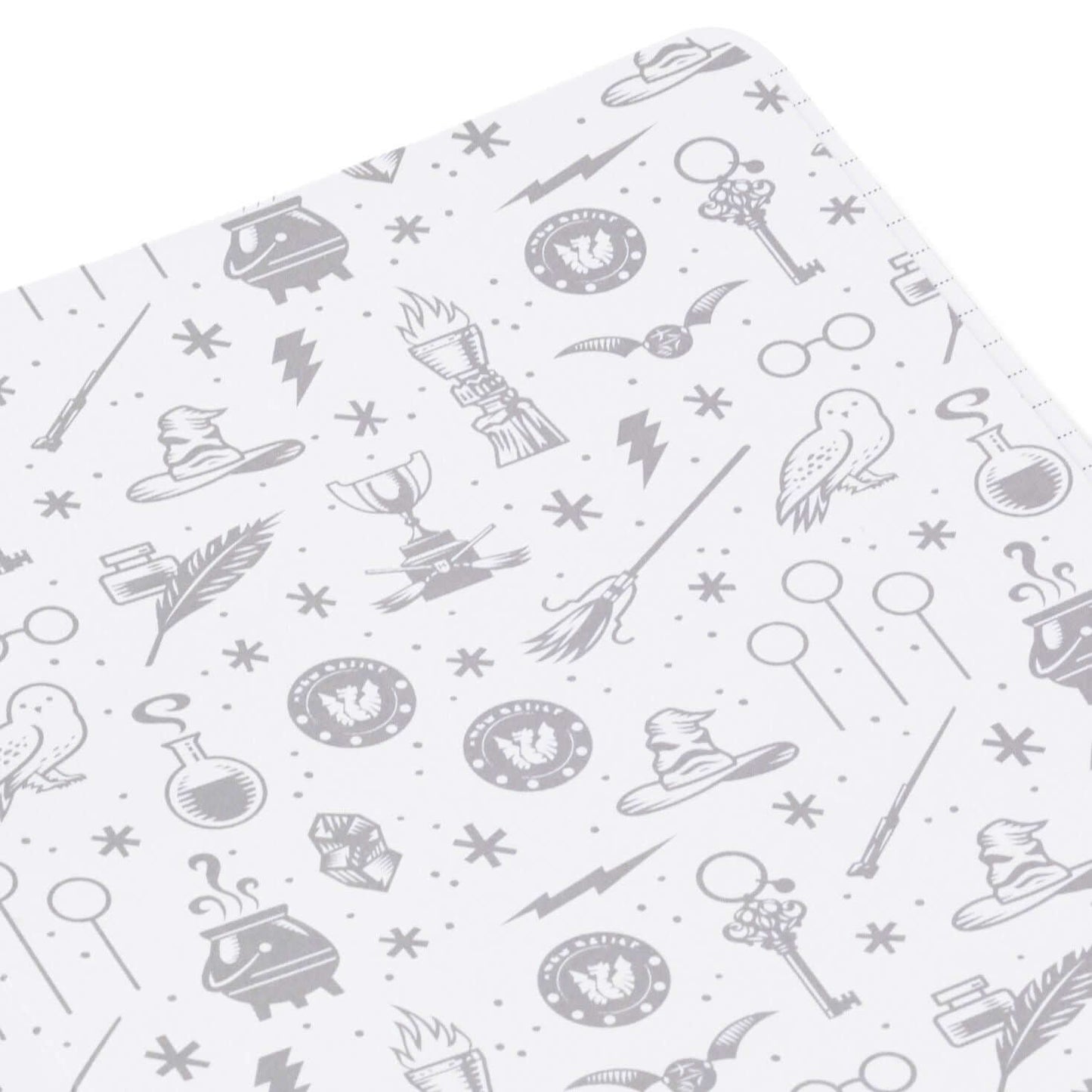 Harry Potter™ faux leather journal, 6.18x8.25, featuring grey patterned illustrations of wizarding items on a white background.