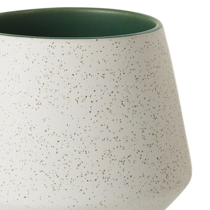 Harry Potter™ Retro Slytherin™ Mug, 770ml with speckled ceramic finish and green interior glaze, close up view.